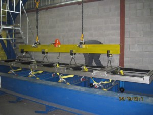 An example is this picture which shows the testing set-up of a long custom made lifting beam to match it’s lower connection points.